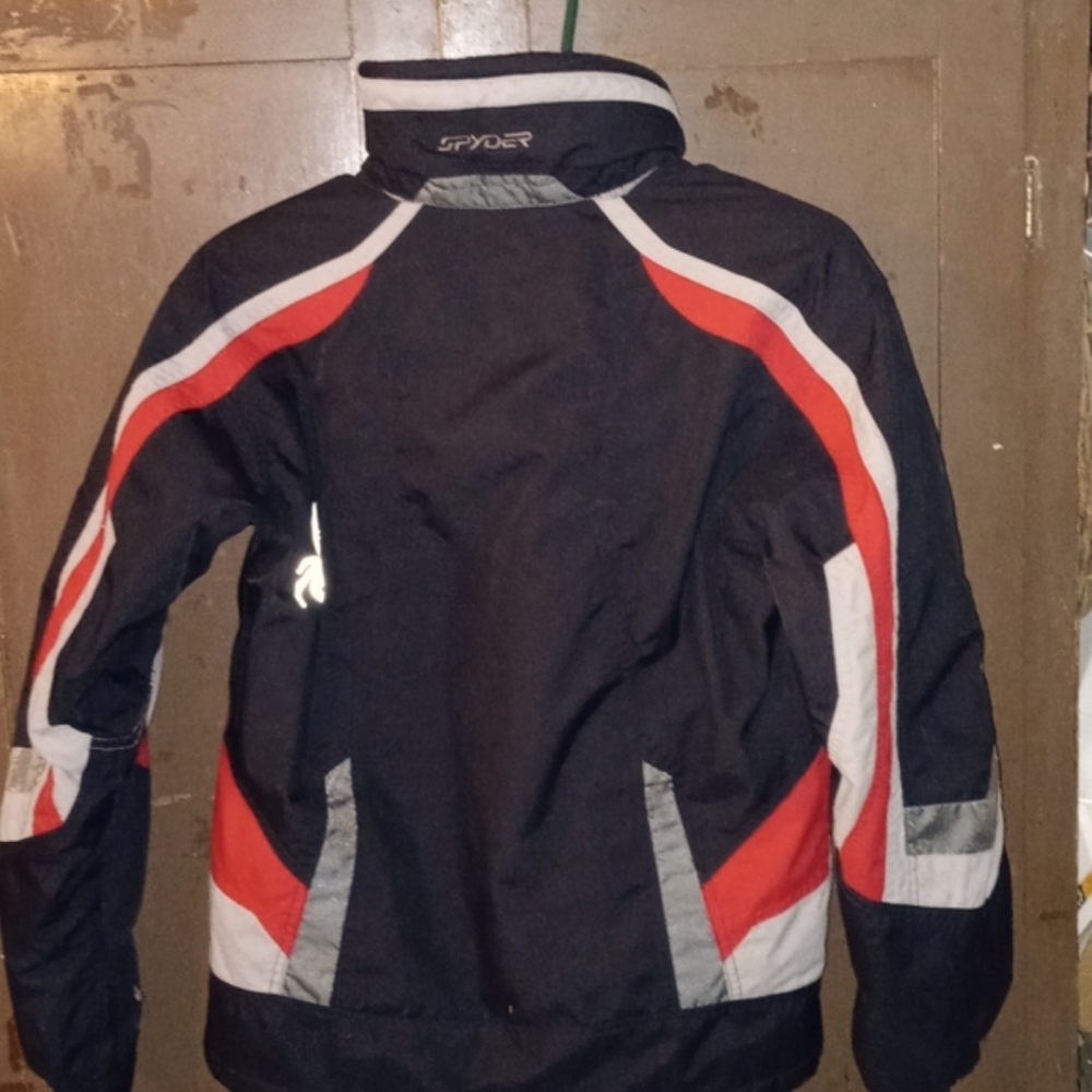 SPYDER KIDS SIZE 16 BLACK/RED WARM COAT WITH ALL THE BELLS AND WHISTLES.